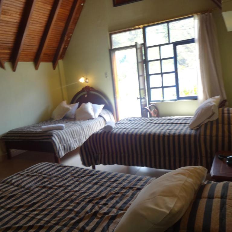 Hosteria Casa Giralda - Habitación Cuádruple Clásica - 2