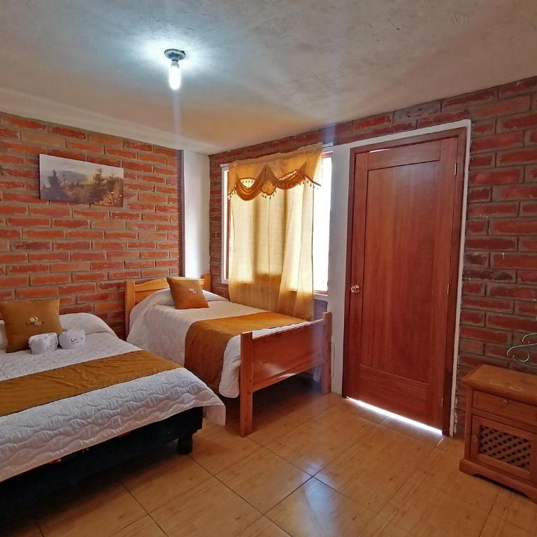 Lagoon Hotel Chugchilan - Habitación Doble con balcón (2 adultos + 1 niño) - 39