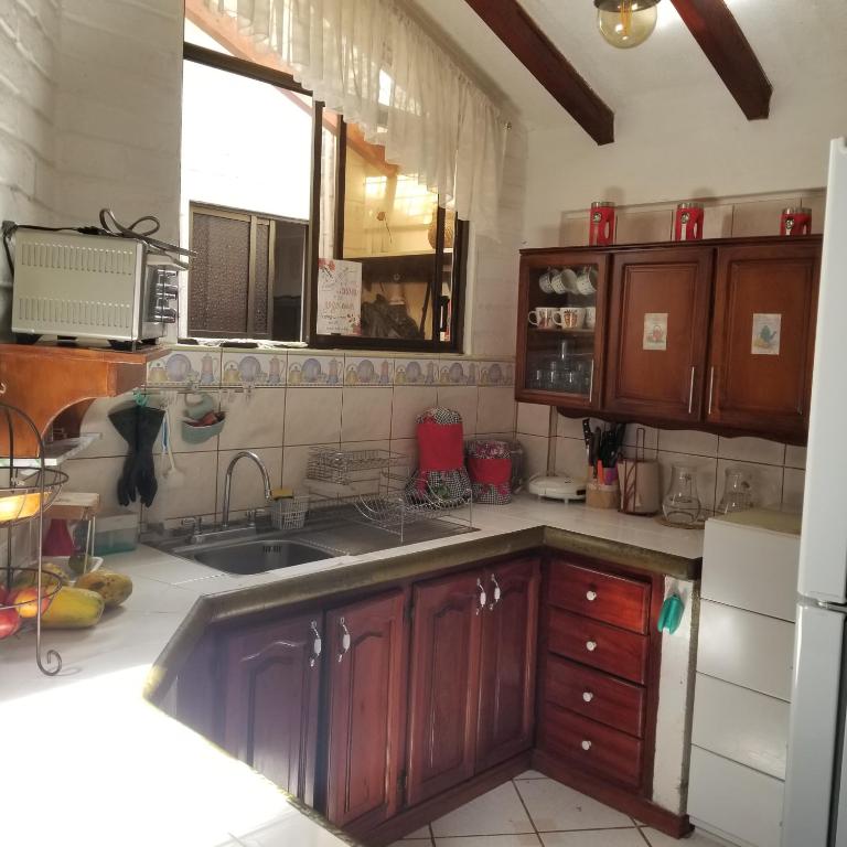 HERMOSA Y COMODA CASA FAMILIAR EN Baños - Apartamento de 2 dormitorios - 17