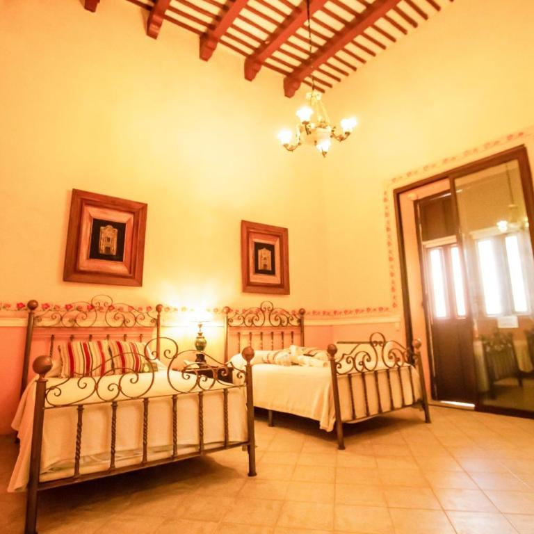 Hotel Boutique La Mision De Fray Diego - Suite Deluxe 2 double beds & garden view - 1