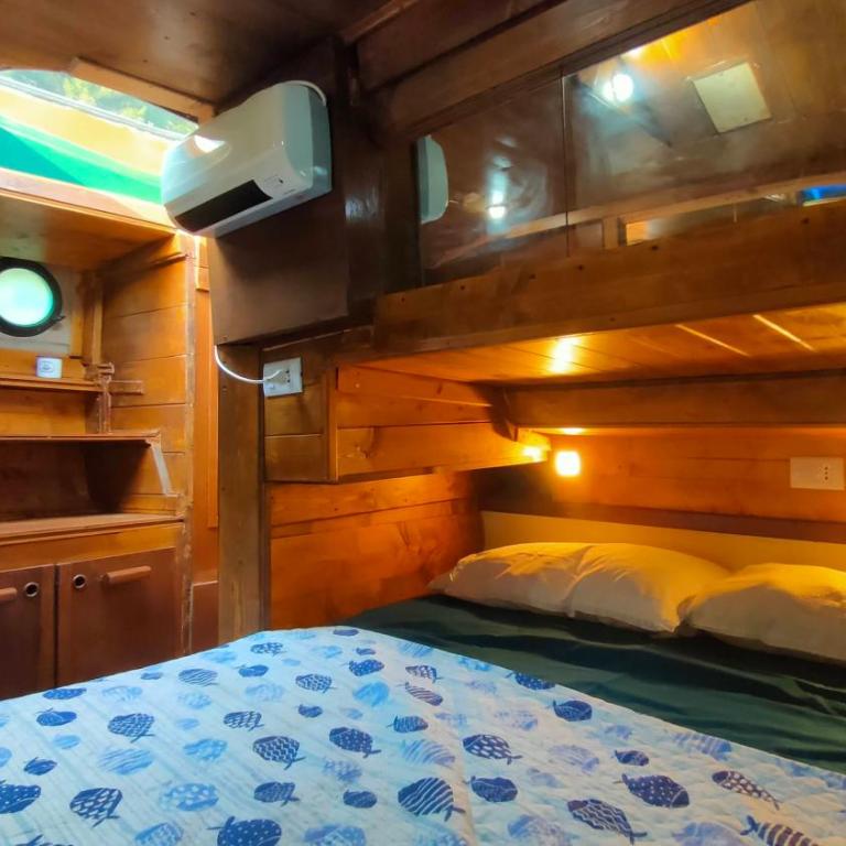 Camping Yoghi e Bubu - Bungalow 1 Chambre - 11