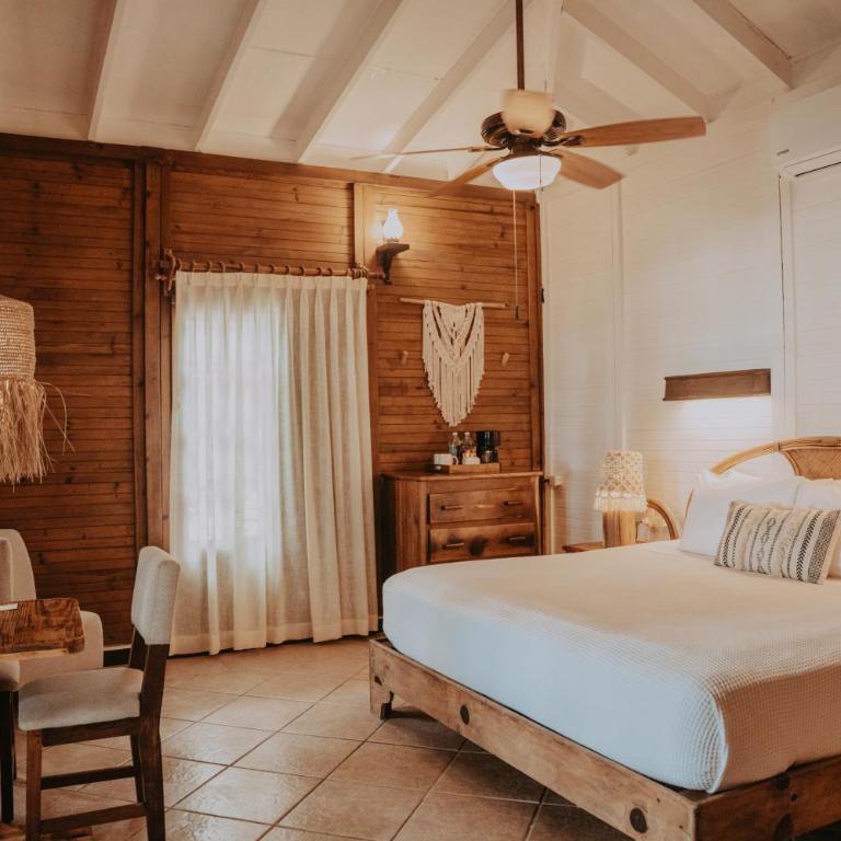 Petit Lafitte Beach Front Hotel & Bungalows - Jungle Experience Bungalow - King Bed - 1
