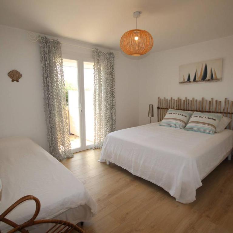FACE à la Mer, Superbe appartement climatisé au RDC d'une maison, classé 4 étoiles, 5 couchages -WIFI-PORTIRAGNES PLAGE LXBFM32 - Appartamento con 2 Camere da Letto - 11