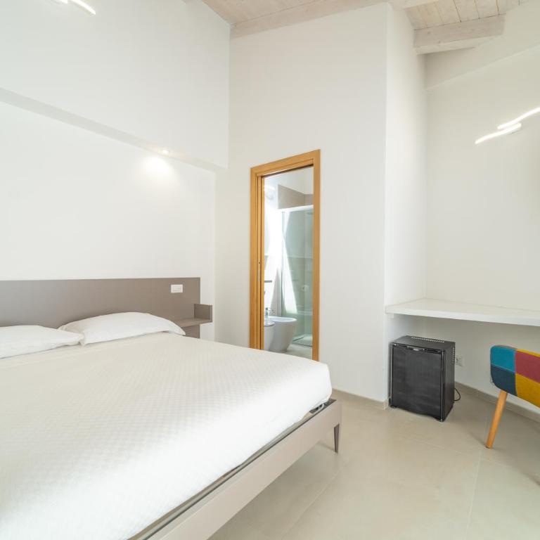 Nuova -Luxury Rooms & Apartment- - Camera Matrimoniale con Patio - 1