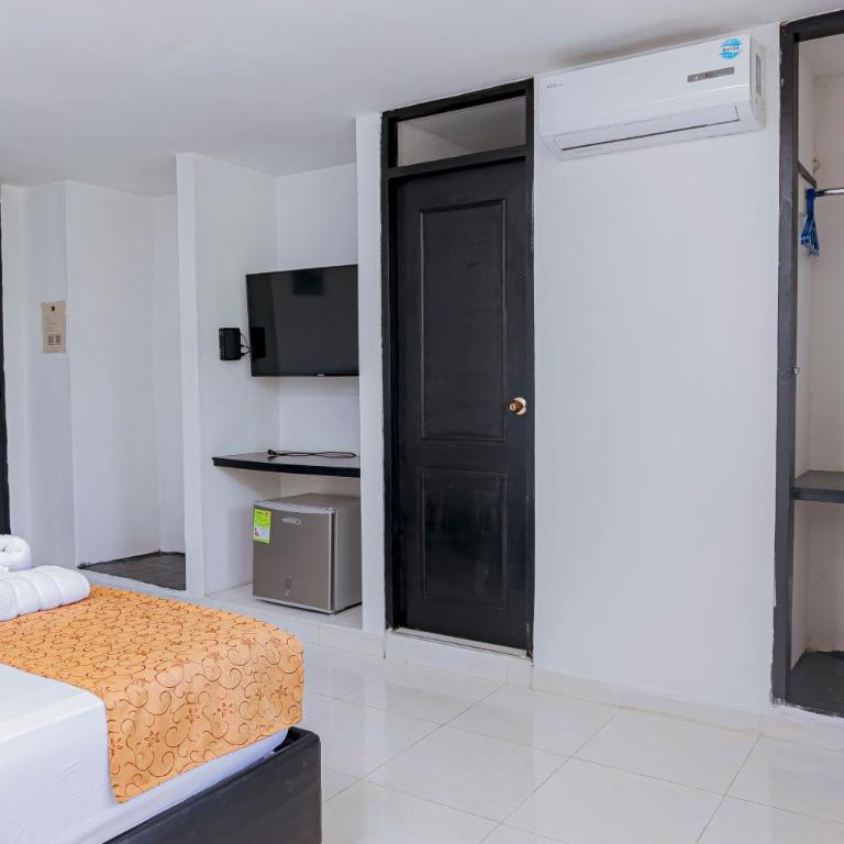 Hotel Sol Inn Santa Marta - Habitación Doble Deluxe con balcón - 5