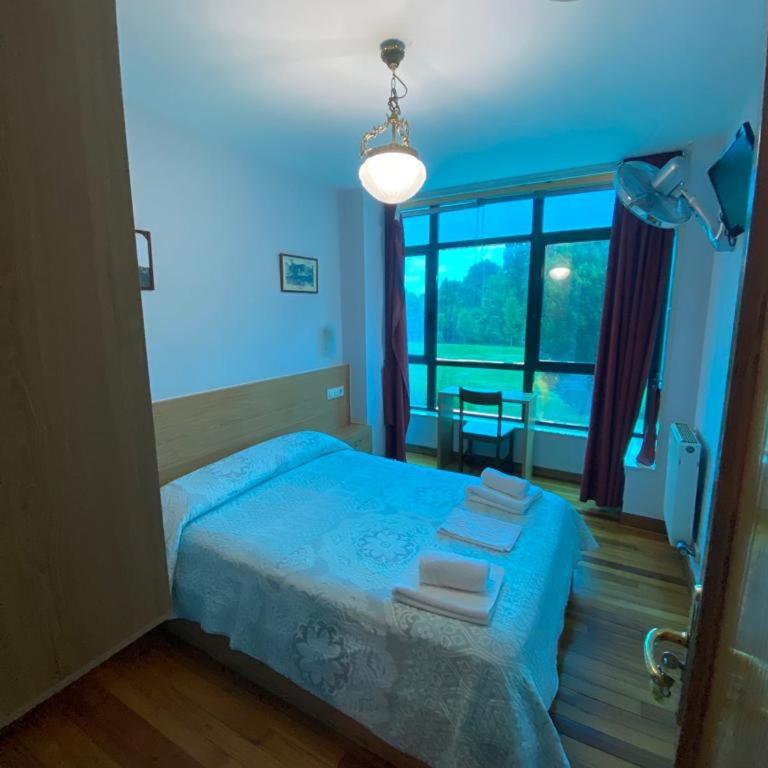Hostal Pumar - Habitación Doble Estándar con baño compartido - 7
