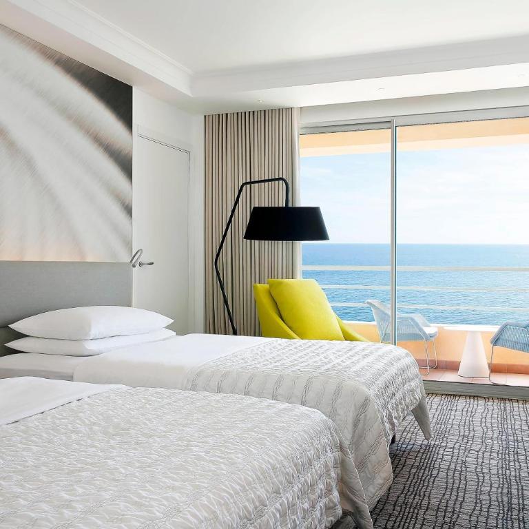 Le Méridien Beach Plaza - Premium Doppelzimmer mit 2 Doppelbetten und Balkon – seitlicher Meerblick - 1