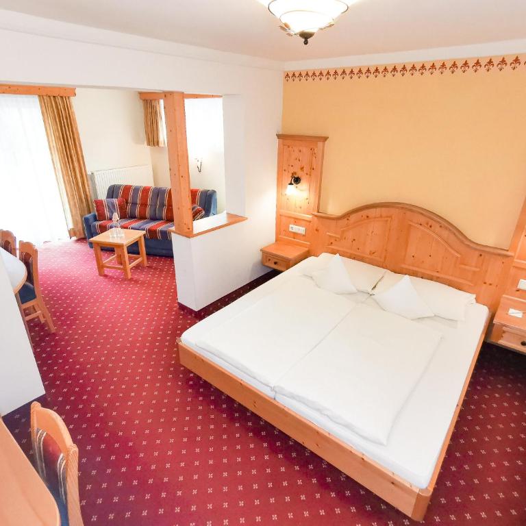 Hotel Angerwirt COSY HOLIDAY HOME - Vierbettzimmer mit Balkon - 1