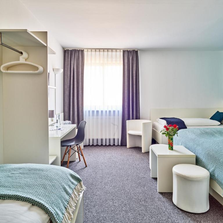Brunnenhof City Center - Chambre Quadruple - Côté Cour - 8