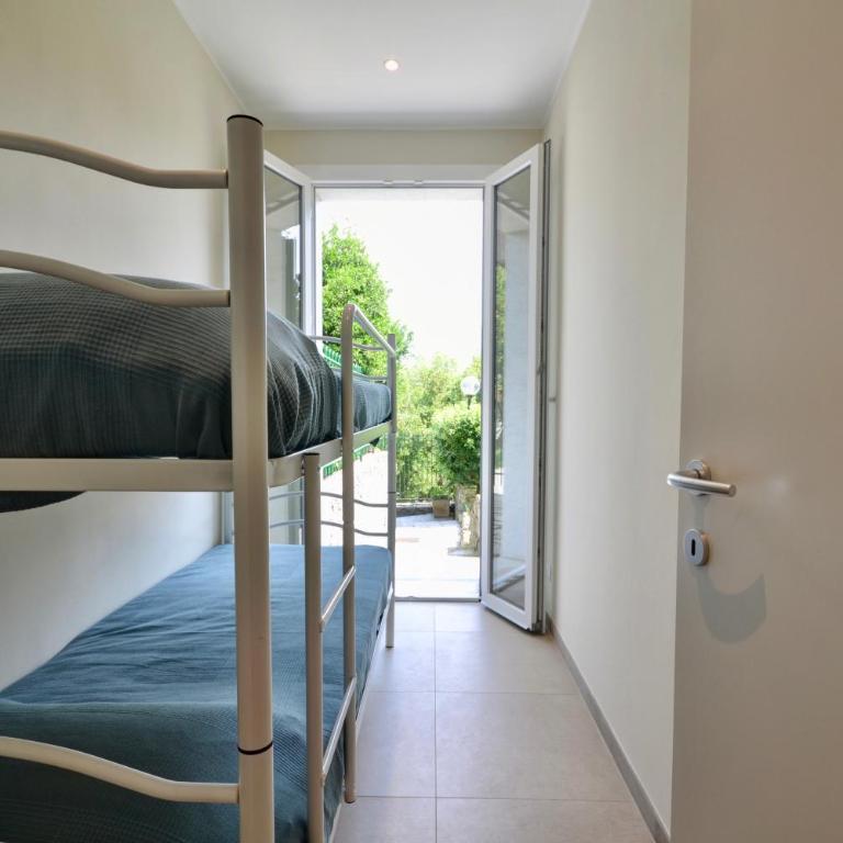 Casa Riva - Giardino e posto auto privato a pochi minuti dalle spiagge - 4 posti letto - Appartamento con 2 Camere da Letto - 21