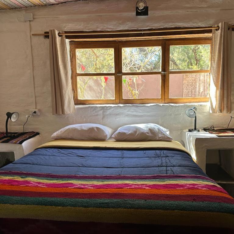CaminAndes Hostal - Habitación Cuádruple con baño privado - 8