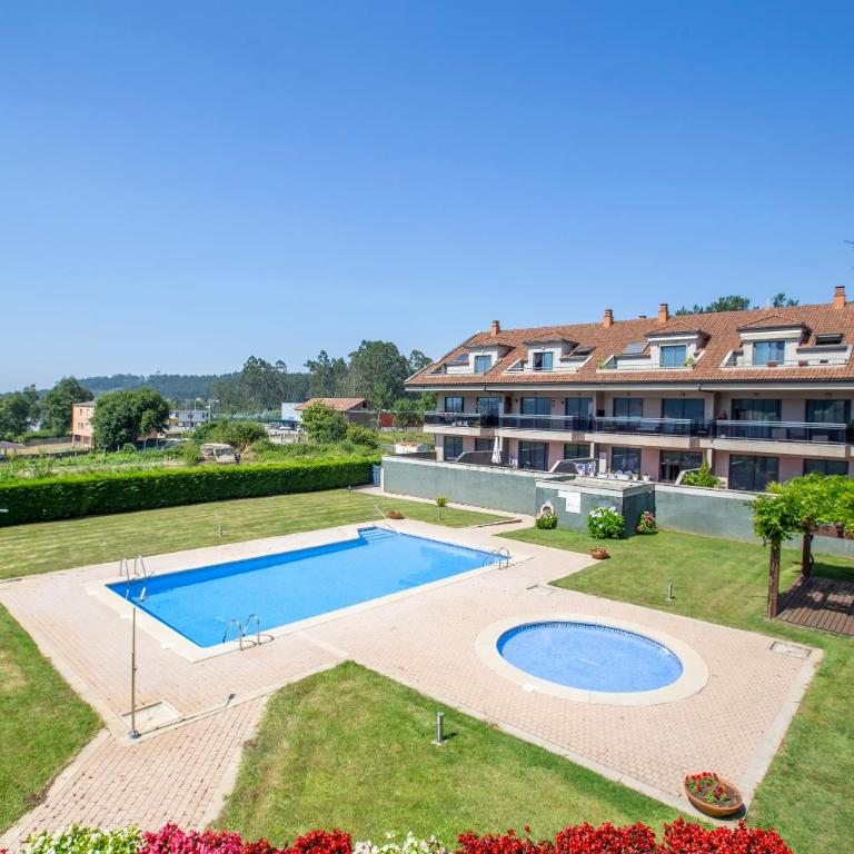 Dúplex en Residencial Vichona en Sanxenxo - Apartamento de 3 dormitorios - 1