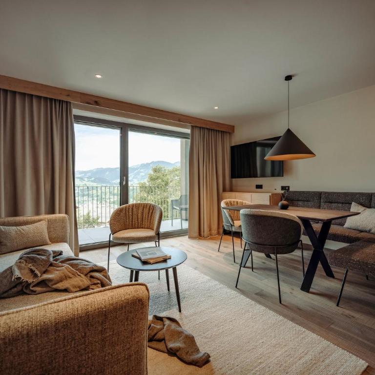 Alpina Alpendorf - Superior Apartment mit Sauna - 10