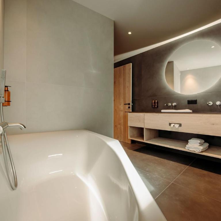 Alpina Alpendorf - Superior Apartment mit Sauna - 6