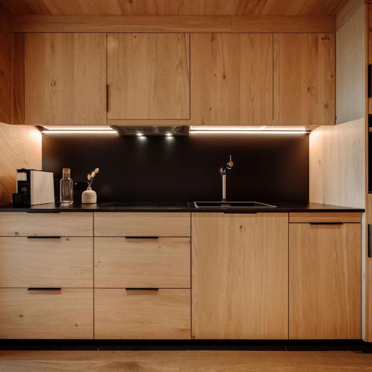 Alpina Alpendorf - Superior Apartment mit Sauna - 12