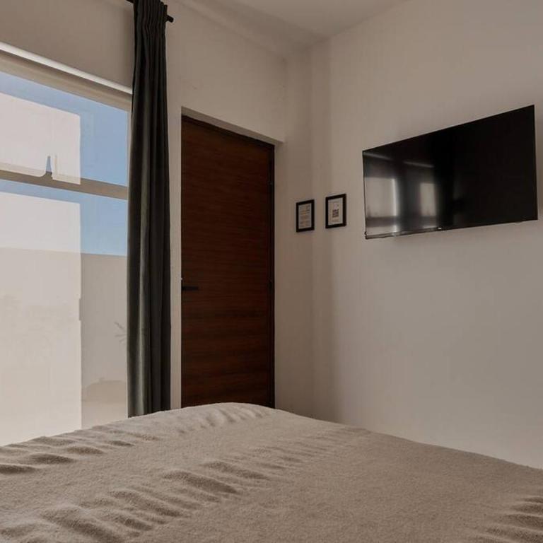 Céntrico Live - Habitación con cama grande - 5