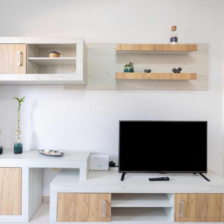 Agradable piso con piscina & playa terraza y WIFI - Apartamento de 1 dormitorio - 9