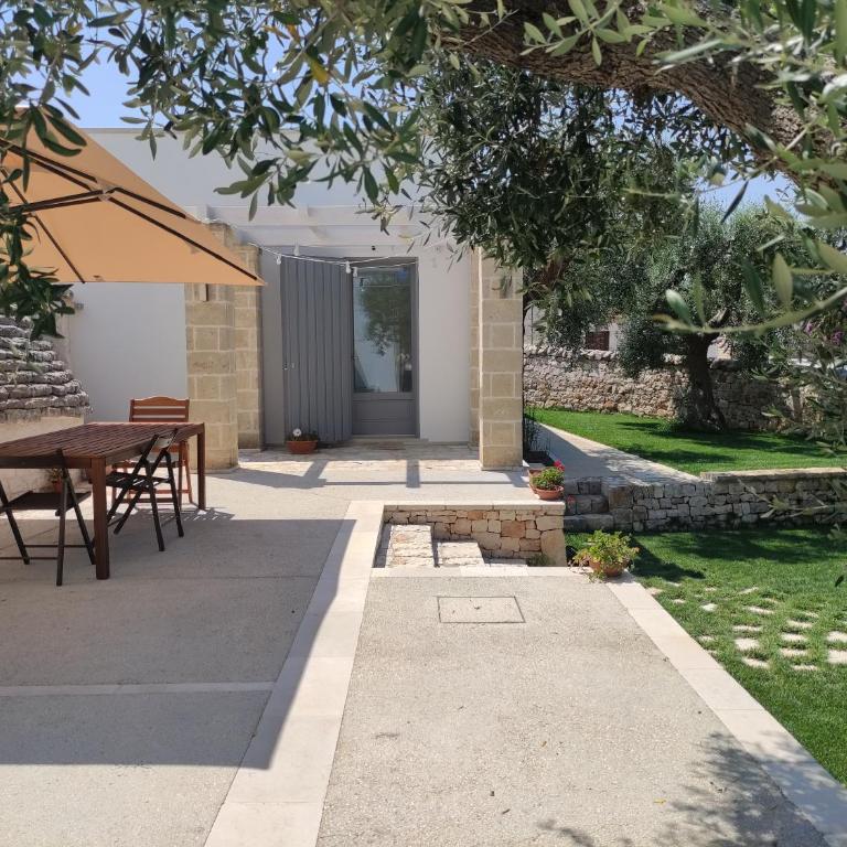 Trulli sull'Aia San Michele - Camera Matrimoniale con Vista Giardino - 4