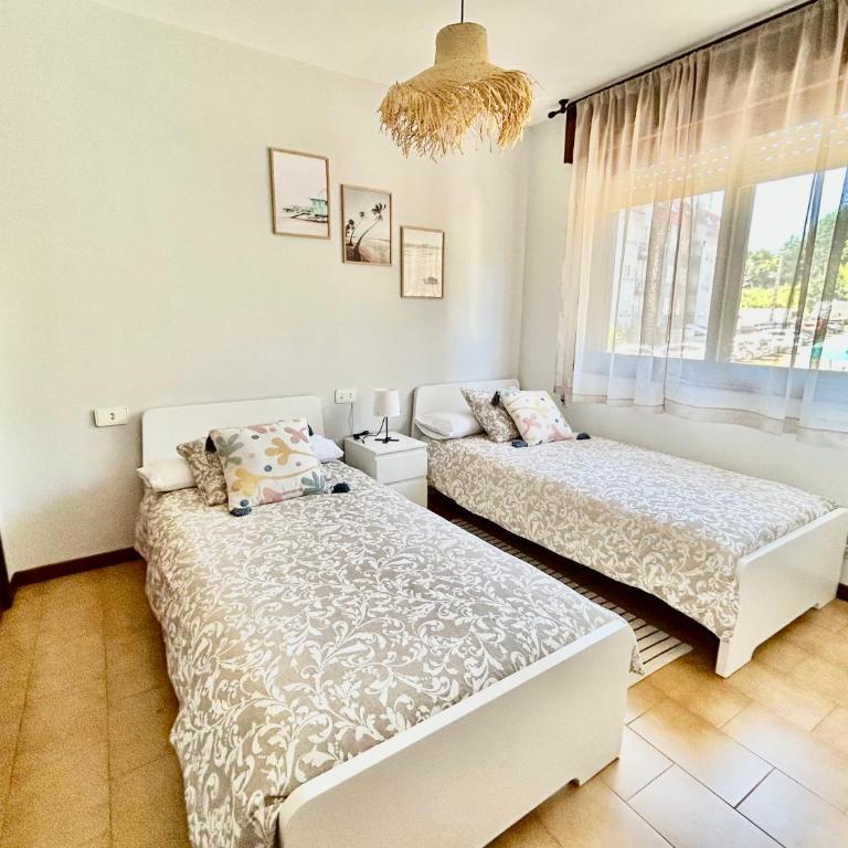 Céntrico piso Sanxenxo parking privado en la playa - Apartamento - 40