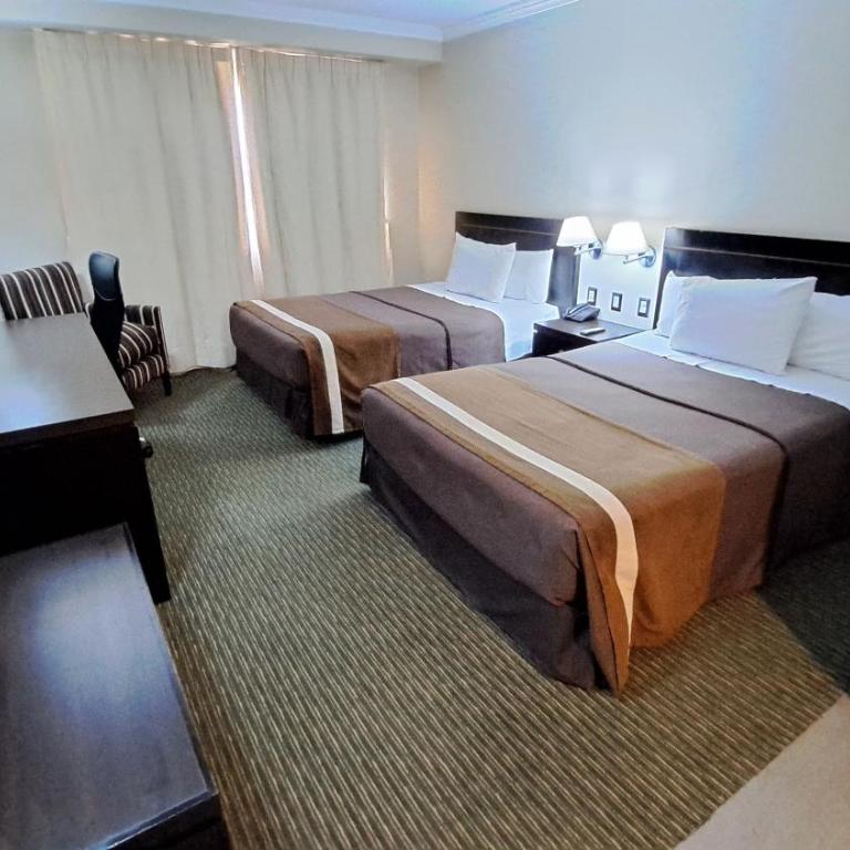 Hotel Diego de Almagro Alto el Loa Calama - Habitación con 2 camas grandes - 9
