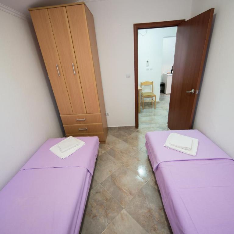 Apartments Pavićević - Two-Bedroom Apartment with Balcony and Garden View - 5
