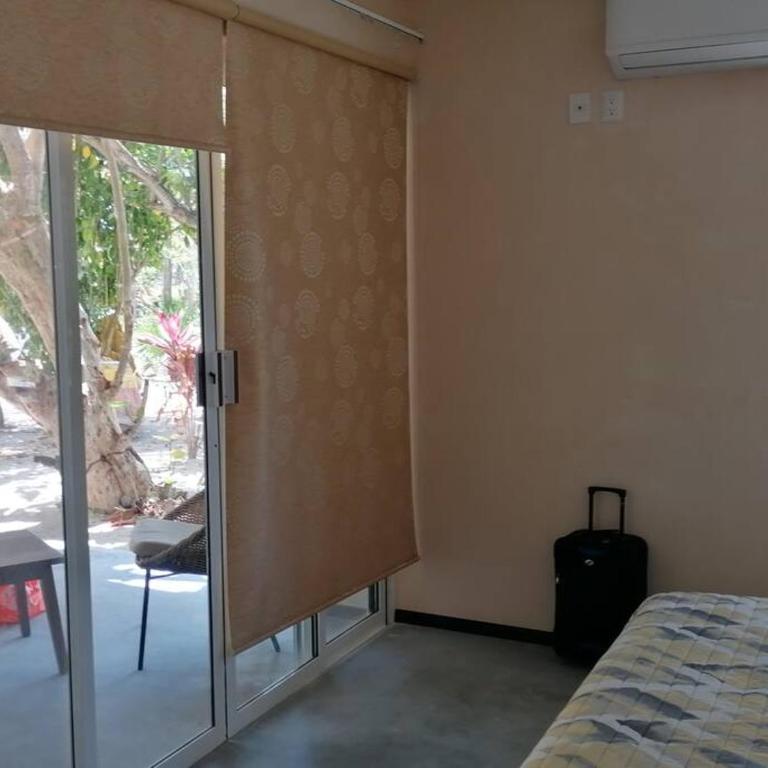 Marysol beachfront next to nomads d2 - One-Bedroom Apartment - 7