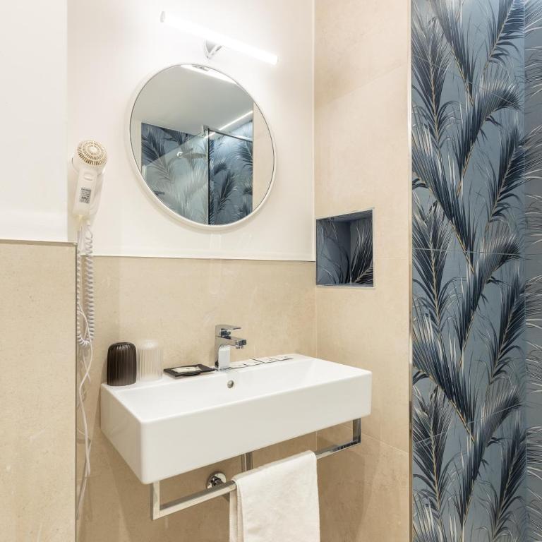 Magnini Rooms - Camera Queen con Vista Mare - 10