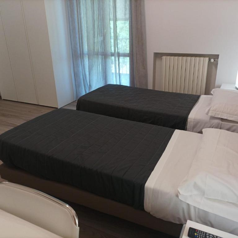 Camere Scandellara 24 - Camera Doppia con Letti Singoli con Balcone - 1
