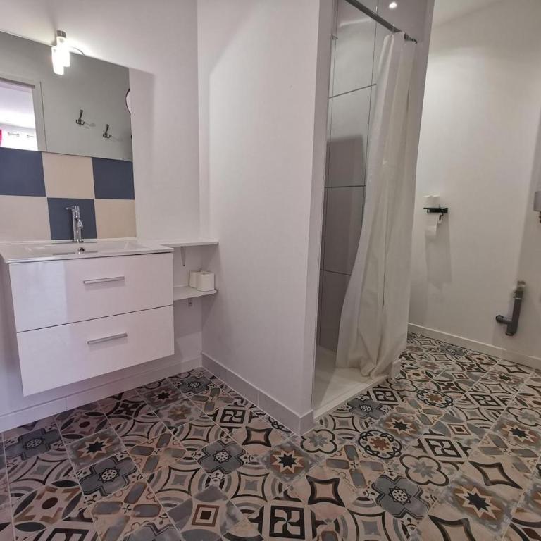 DOUMO - Appartement - Rez-de-Chaussée - 10