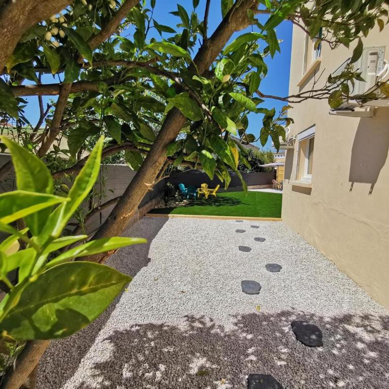 DOUMO - Appartement - Vue sur Jardin - 7