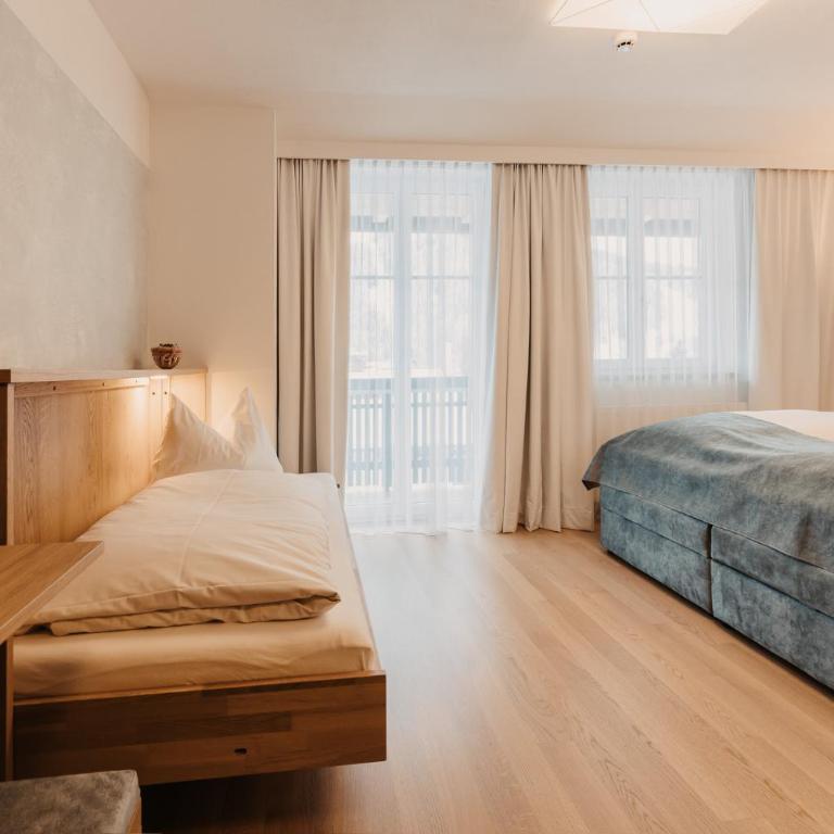 Alpina Wagrain - Vierbettzimmer mit Balkon - 3