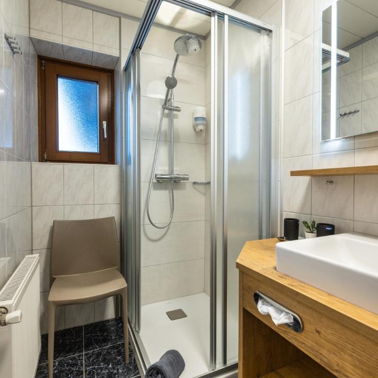 Sportpension Bergblick - Apartment mit 4 Schlafzimmern und einem Balkon - 4