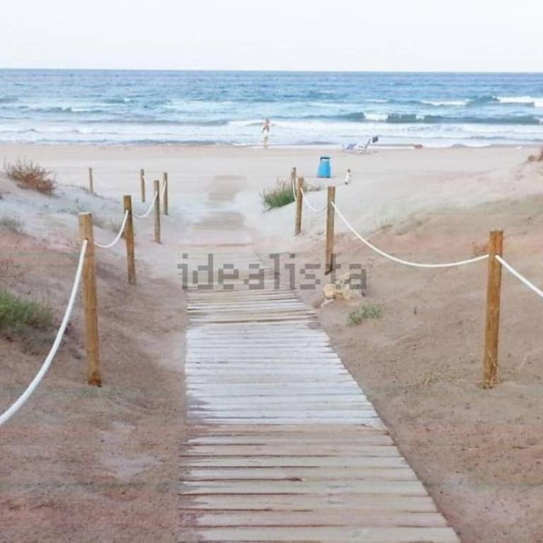 Chalet adosado en la playa de El Perellonet con piscina, pista tenis - Four-Bedroom House - 17