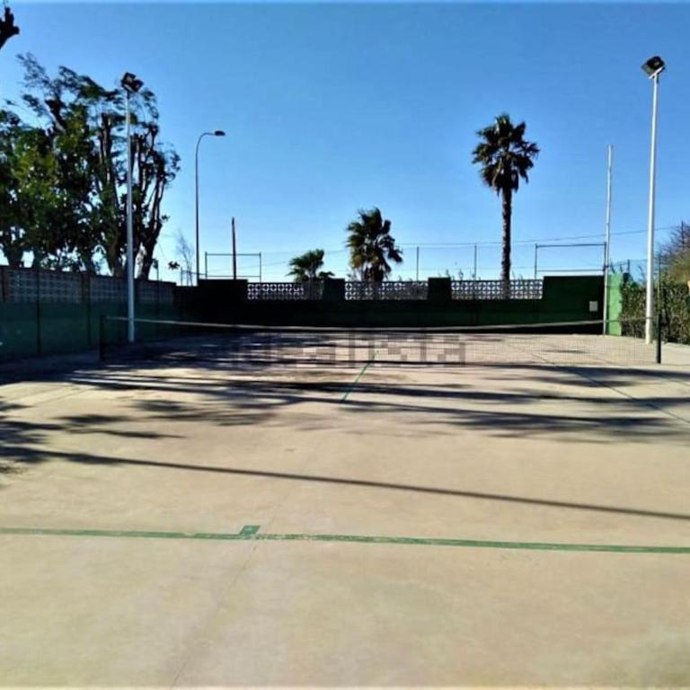 Chalet adosado en la playa de El Perellonet con piscina, pista tenis - Four-Bedroom House - 18