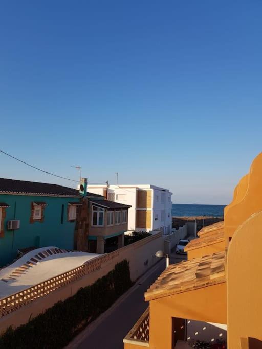 Chalet adosado en la playa de El Perellonet con piscina, pista tenis - Four-Bedroom House - 47