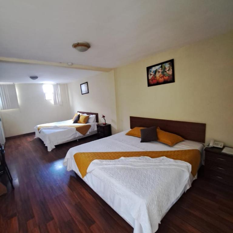 Hotel Mariscal Inn & Suite - Habitación Doble con baño privado - 2 camas - 6