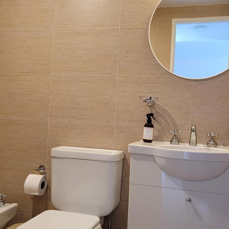 Departamento moderno con cochera y parrilla, amplio y luminoso - Apartamento de 1 dormitorio - 26