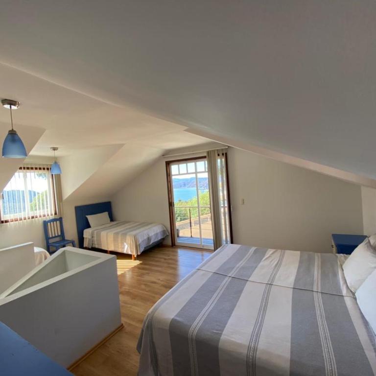 Cabañas Tr'eje - Family Room with Lake View - 20