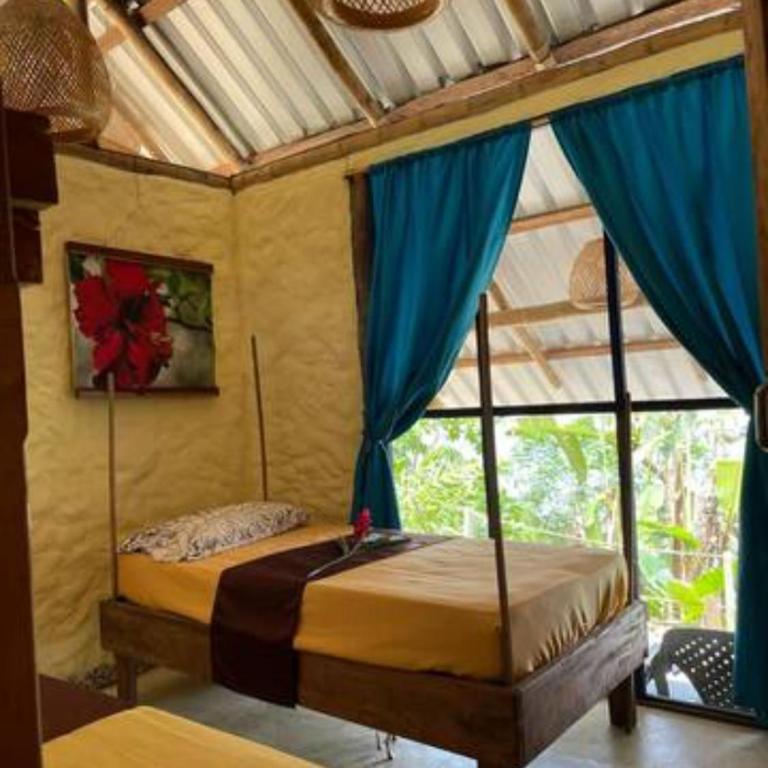 Ecolodge el Arca Bahia Solano - Habitación Cuádruple con baño privado externo - 3