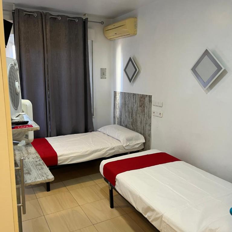 Hostal Las Vegas - Camera Doppia con Letti Singoli - 1