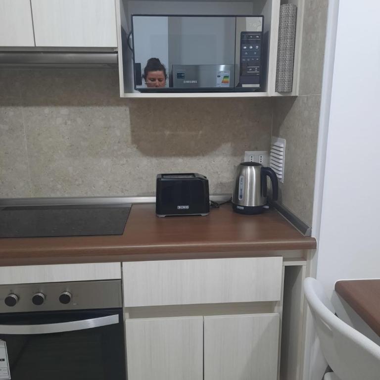 Acogedor Departamento Central con Piscina, Estacionamiento Privado y Más - One-Bedroom Apartment - 13