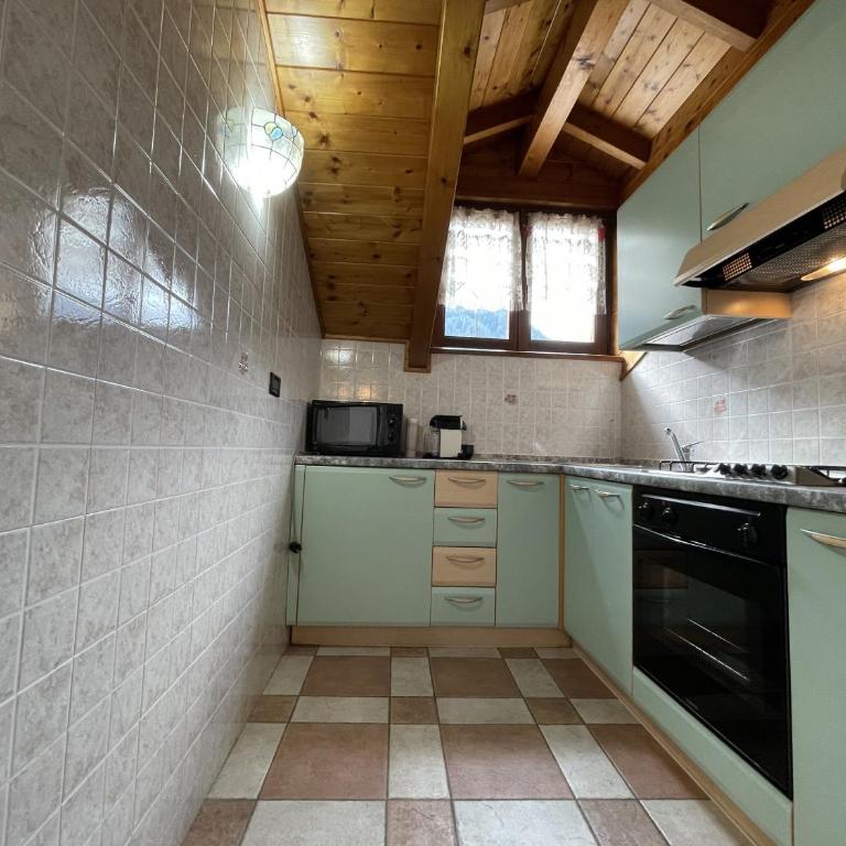 032 Mansarda Pinzolo - Appartamento con 2 Camere da Letto - 4