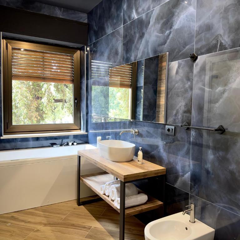 Ancor Apartments - Deluxe Double Room with Bath - 1