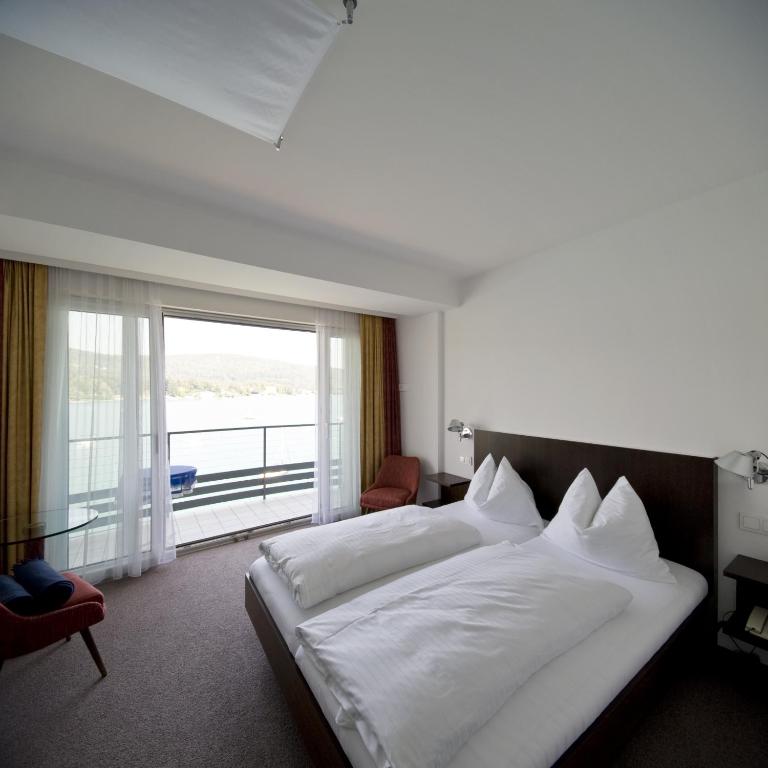 Boutiquehotel Ogris Am See - Doppelzimmer mit Balkon und Seeblick - 4