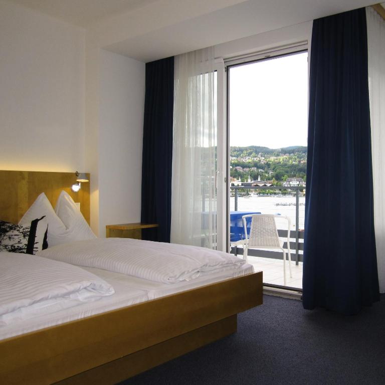 Boutiquehotel Ogris Am See - Doppelzimmer mit Balkon und Seeblick - 3