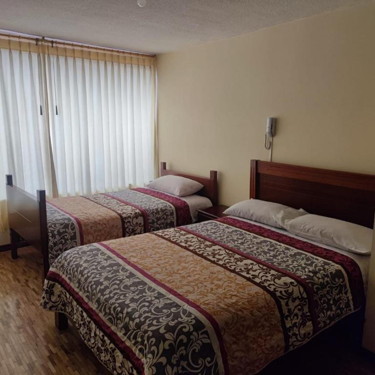 HOSTAL EL CONFORT QUITO NORTE - Habitación Doble - 2 camas - 2