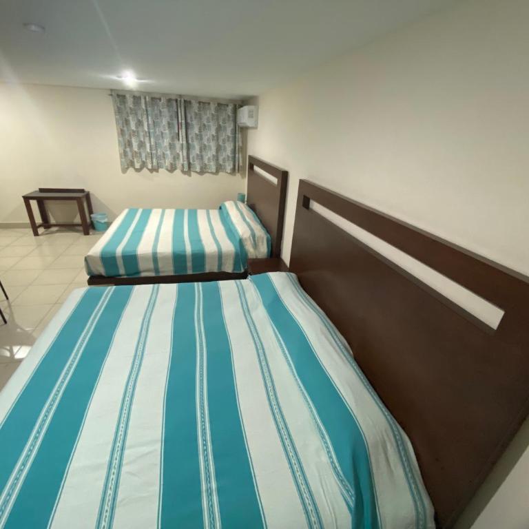 CORDIALITY INN - Habitación Deluxe con 2 camas grandes - 5