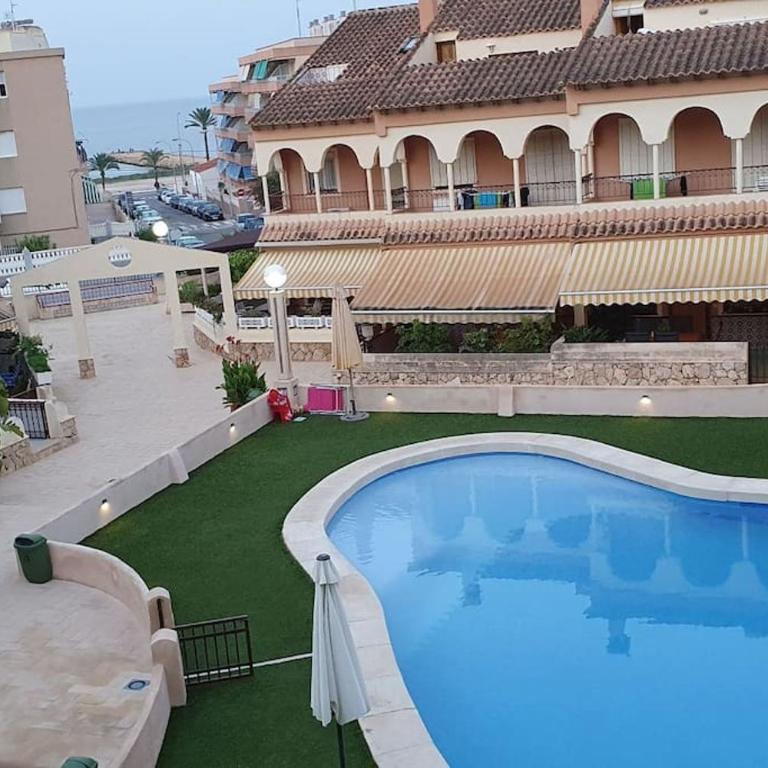 Precioso apartamento en complejo residencial con piscina y vistas al mar - Apartamento de 2 dormitorios - 1