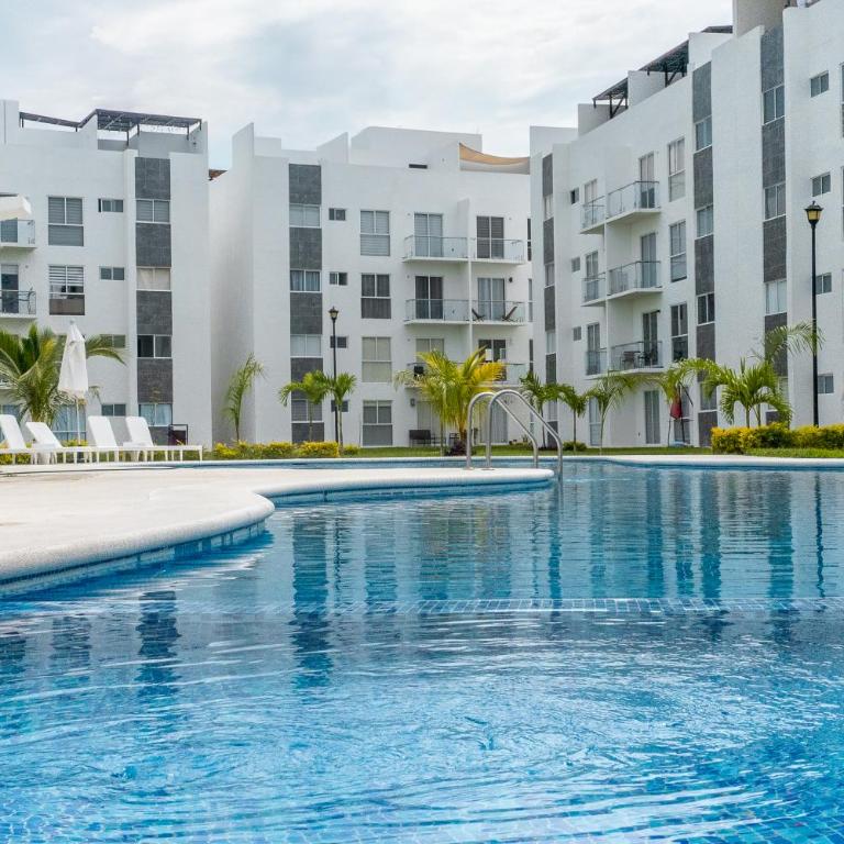 Apartamento con Alberca SmartTV y Jardin - Apartamento de 2 dormitorios - 1