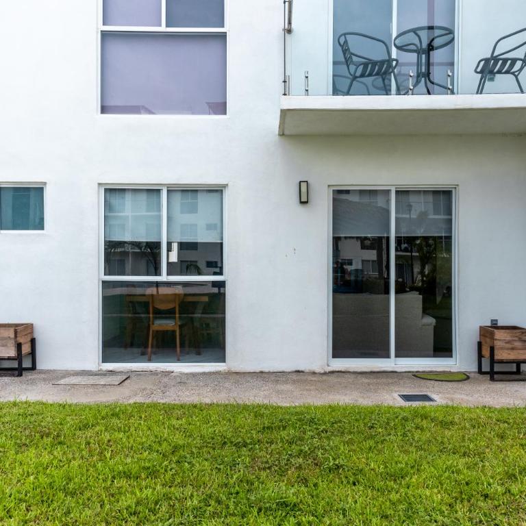 Apartamento con Alberca SmartTV y Jardin - Apartamento de 2 dormitorios - 24